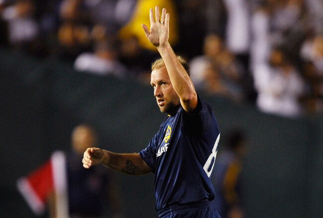PASADENA, CA - AUGUST 07:  Clint Mathis #84 of Los Angeles Galaxy waves goodbye as he exits the pitch during their pre-season friendly soccer match against  of Real Madrid on August 7, 2010 at the Rose Bowl in Pasadena, California. Real Madrid will travel back to Spain after the soccer match completing their pre-season USA tour. Mathis, who announced his retirement on Tuesday, played his last professional match.  (Photo by Kevork Djansezian/Getty Images)