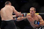 DALLAS - SEPTEMBER 19:  UFC fighter Junior Dos Santos (R) battles UFC fighter Mirko Cro Cop (L) during their Heavyweight bout at UFC 103: Franklin vs. Belfort at the American Airlines Center on September 19, 2009 in Dallas, Texas.  (Photo by Jon Kopaloff/Getty Images)