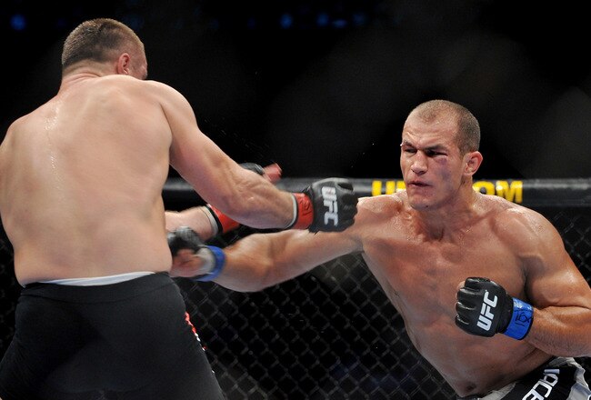DALLAS - SEPTEMBER 19:  UFC fighter Junior Dos Santos (R) battles UFC fighter Mirko Cro Cop (L) during their Heavyweight bout at UFC 103: Franklin vs. Belfort at the American Airlines Center on September 19, 2009 in Dallas, Texas.  (Photo by Jon Kopaloff/Getty Images)