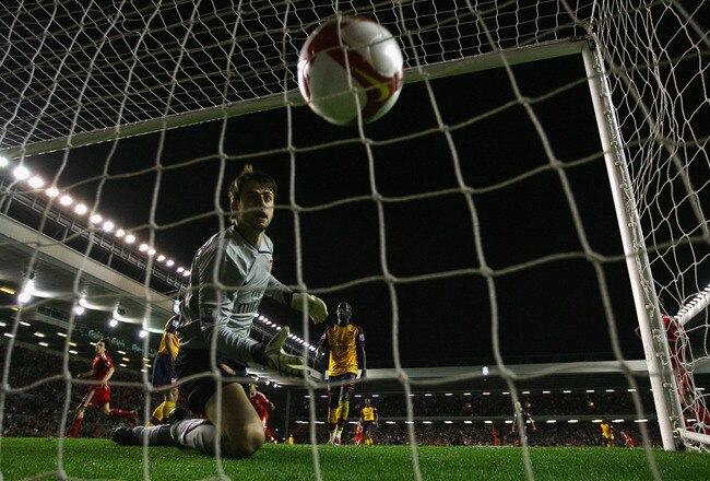 LIVERPOOL, UNITED KINGDOM - APRIL 21:  Lukasz Fabianski  of Arsenal looks on as Yossi Benayoun of Liverpool scores his team's fourth goal during the Barclays Premier League match between Liverpool and Arsenal at Anfield on April 21, 2009 in Liverpool, England.  (Photo by Laurence Griffiths/Getty Images)