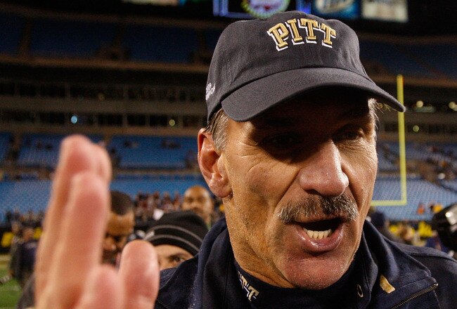 CHARLOTTE, NC - DECEMBER 26:  Head coach Dave Wannstedt of the Pittsburgh Panthers celebrates with players after a 19-17 victory over the North Carolina Tar Heels on December 26, 2009 in Charlotte, North Carolina.  (Photo by Streeter Lecka/Getty Images)