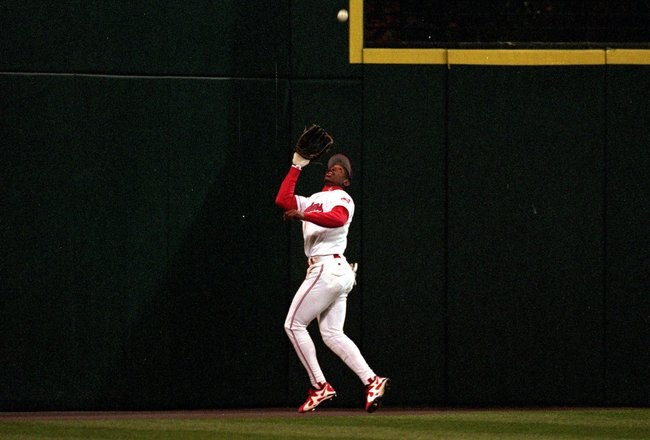 24 Oct 1995: Kenny Lofton of the Cleveland Indians runs back to catch the ball during game three of the World Series against the Atlanta Braves at the Jacobs Field in Cleveland, Ohio. The Indians defeated the Braves 7-6.