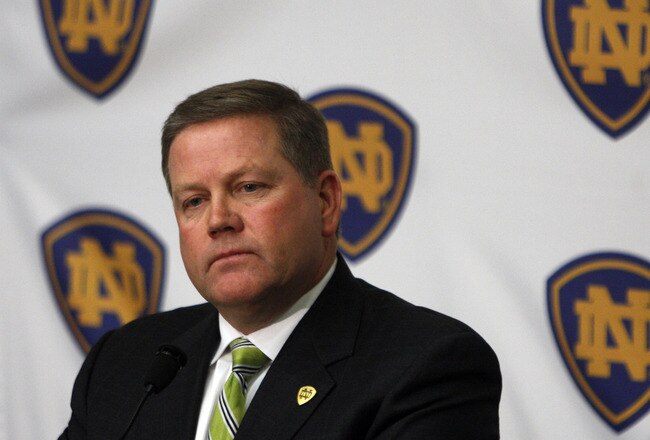 SOUTH BEND, IN - DECEMBER 11: Brian Kelly attends a press conference where he was named new football head coach at Notre Dame University on December 11, 2009 in South Bend, Indiana.  Kelly most recently led the University of Cincinnati to two consecutive Bowl Championship Series appearances including a perfect 12-0 record this past season. (Photo by Frank Polich/Getty Images)
