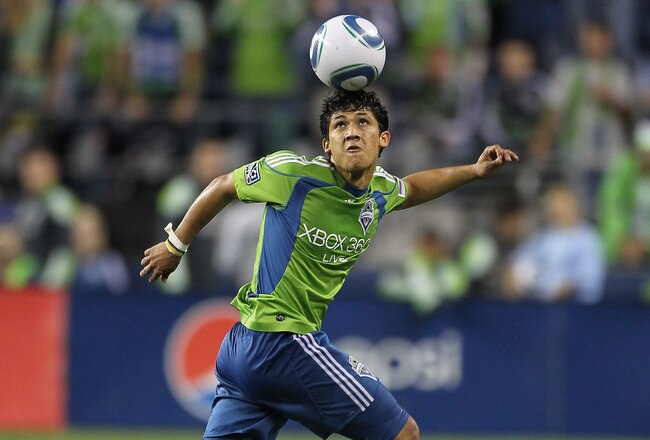 SEATTLE - AUGUST 08:  Fredy Montero #17 of the Seattle Sounders FC heads the ball against the Houston Dynamo on August 8, 2010 at Qwest Field in Seattle, Washington. The Sounders defeated the Dynamo 2-0. (Photo by Otto Greule Jr/Getty Images)