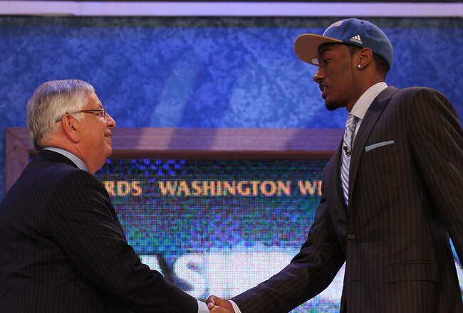 NEW YORK - JUNE 24:  John Wall of Kentucky stands with NBA Commisioner David Stern after being drafted with the first pick by the Washington Wizards at Madison Square Garden on June 24, 2010 in New York City.  NOTE TO USER: User expressly acknowledges and agrees that, by downloading and or using this photograph, User is consenting to the terms and conditions of the Getty Images License Agreement. (Photo by Al Bello/Getty Images)