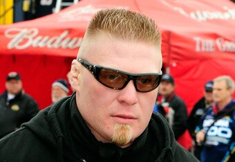 DAYTONA BEACH, FL - FEBRUARY 13:  MMA fighter Brock Lesnar walks in the garage area during practice for the Daytona 500 at Daytona International Speedway on February 13, 2010 in Daytona Beach, Florida.  (Photo by Sam Greenwood/Getty Images for NASCAR)