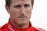 LONG POND, PA - JULY 30:  Kasey Kahne, driver of the #9 Budweiser Ford, stands on the grid during qualifying for the NASCAR Sprint Cup Series Sunoco Red Cross Pennsylvania 500 at Pocono Raceway on July 30, 2010 in Long Pond, Pennsylvania.  (Photo by Todd Warshaw/Getty Images for NASCAR)