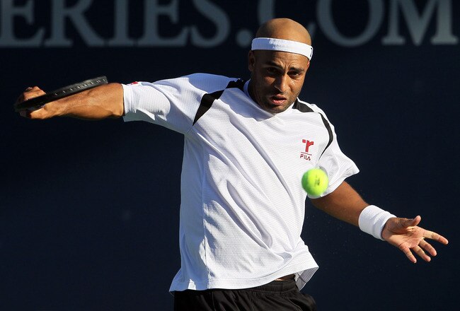 LOS ANGELES, CA - JULY 30:  James Blake returns a backhand to Feliciano Lopez of Spain during the Farmers Classic at the Los Angeles Tennis Center - UCLA on July 30, 2010 in Los Angeles, California.  (Photo by Jeff Gross/Getty Images)