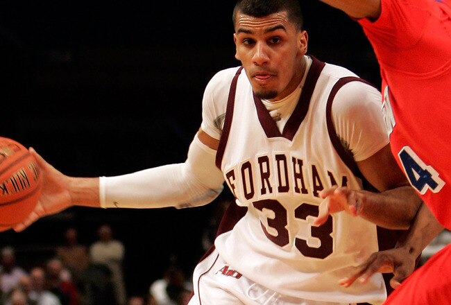 NEW YORK - JANUARY 13:  Chris Gaston #33 of the Fordham Rams handles the ball against Josh Benson #44 of the Dayton Flyers at Madison Square Garden on January 13, 2010 in New York, New York.  (Photo by Mike Lawrie/Getty Images)