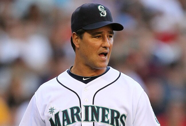 SEATTLE - JULY 24:  Manager Don Wakamatsu #22 of the Seattle Mariners heads back to the dugout after questioning a call in the first inning in which Chone Figgins #9 of the Mariners was called out on a bunt during the game against the Boston Red Sox at Safeco Field on July 24, 2010 in Seattle, Washington. (Photo by Otto Greule Jr/Getty Images)