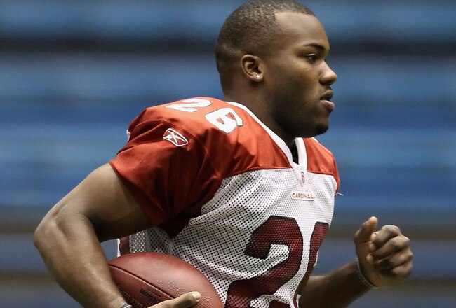 FLAGSTAFF, AZ - AUGUST 02:  Runningback Beanie Wells #26 of the Arizona Cardinals practices in the team training camp at Northern Arizona University Walkup Skydome on August 2, 2010 in Flagstaff, Arizona.  (Photo by Christian Petersen/Getty Images)