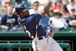 GOODYEAR , AZ - MARCH 06:  Lorenzo Cain #62 of the Milwaukee Brewers bats against the Cleveland Indians during the spring training game at Goodyear Ballpark on March 6, 2009 in Goodyear, Arizona. The Brewers defeated the Indians 17-7.  (Photo by Christian Petersen/Getty Images)