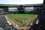 MILWAUKEE, WI - APRIL 05: The Colorado Rockies and Milwaukee Brewers line up on the base lines after introductions during the National Anthem prior to the game between the Colorado Rockies against the Milwaukee Brewers at the Miller Park on April 05, 2010 in Milwaukee, Wisconsin. (Photo by Scott Boehm/Getty Images)