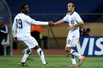 RUSTENBURG, SOUTH AFRICA - JUNE 26:  Landon Donovan of the United States celebrates scoring from the penalty spot with Maurice Edu (L) during the 2010 FIFA World Cup South Africa Round of Sixteen match between USA and Ghana at Royal Bafokeng Stadium on June 26, 2010 in Rustenburg, South Africa.  (Photo by Ian Walton/Getty Images)