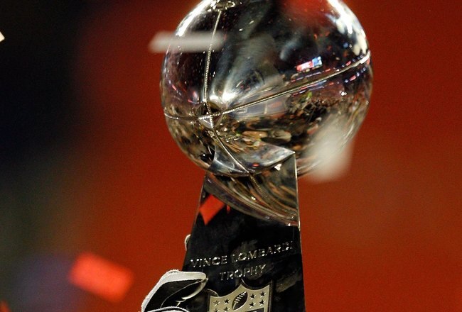 MIAMI GARDENS, FL - FEBRUARY 07:  A detail of the Vince Lombardi Trophy as the New Orleans Saints celebrate after defeating the Indianapolis Colts during Super Bowl XLIV on February 7, 2010 at Sun Life Stadium in Miami Gardens, Florida.  (Photo by Jonathan Daniel/Getty Images)