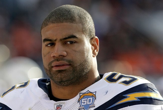 DENVER - NOVEMBER 22:  Linebacker Shawne Merriman #56 of the San Diego Chargers looks on from the sidelines against the Denver Broncos during NFL action at Invesco Field at Mile High on November 22, 2009 in Denver, Colorado. The Chargers defeated the Broncos 32-3.  (Photo by Doug Pensinger/Getty Images)