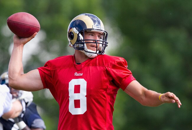 EARTH CITY, MO - JULY 31: Sam Bradford #8 of the St. Louis Rams passes during training camp at the Russell Athletic Training Facility on July 31, 2010 in Earth City, Missouri.  (Photo by Dilip Vishwanat/Getty Images)