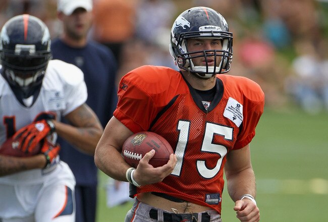 ENGLEWOOD, CO - AUGUST 05:  Quarterback Tim Tebow #15 of the Denver Bronocs takes part in practice during training camp at Dove Valley on August 5, 2010 in Englewood, Colorado.  (Photo by Doug Pensinger/Getty Images)