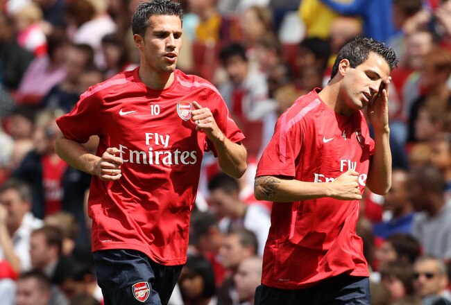LONDON, ENGLAND - AUGUST 05:  Cesc Fabregas (r) and Robin van Persie attend an Arsenal open training session at Emirates Stadium on August 5, 2010 in London, England.  (Photo by Bryn Lennon/Getty Images)