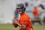 BOURBONNAIS, IL - JULY 30: Dan LeFevour #15 of the Chicago Bears works out during a summer training camp practice at Olivet Nazarene University on July 30, 2010 in Bourbonnais, Illinois. (Photo by Jonathan Daniel/Getty Images)