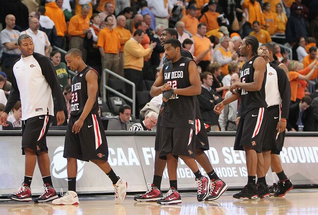 PROVIDENCE, RI - MARCH 19:  Members of the San Diego State Aztecs leave the court after a 62-59 loss to the Tennessee Volunteers during the first round of the 2010 NCAA men's basketball tournament at Dunkin' Donuts Center on March 19, 2010 in Providence, Rhode Island. (Jim Rogash/Getty Images)