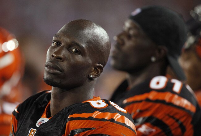 CANTON, OH - AUGUST 8: Chad Ochocinco #85 and Terrell Owens #81 of the Cincinnati Bengals look on against the Dallas Cowboys during the 2010 Pro Football Hall of Fame Game at the Pro Football Hall of Fame Field at Fawcett Stadium on August 8, 2010 in Canton, Ohio. (Photo by Joe Robbins/Getty Images)
