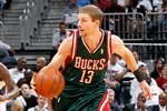 ATLANTA - APRIL 28:  Luke Ridnour #12 of the Milwaukee Bucks against the Atlanta Hawks during Game Five of the Eastern Conference Quarterfinals of the 2010 NBA Playoffs at Philips Arena on April 28, 2010 in Atlanta, Georgia.  NOTE TO USER: User expressly acknowledges and agrees that, by downloading and/or using this Photograph, User is consenting to the terms and conditions of the Getty Images License Agreement.  (Photo by Kevin C. Cox/Getty Images)