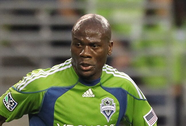 SEATTLE - AUGUST 08:  Blaise Nkufo #9 of the Seattle Sounders FC dribbles against the Houston Dynamo on August 8, 2010 at Qwest Field in Seattle, Washington. The Sounders defeated the Dynamo 2-0. (Photo by Otto Greule Jr/Getty Images)