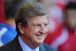 LIVERPOOL, ENGLAND - AUGUST 05:  Roy Hodgson of Liverpool looks on from the dugout before the Europa League, Third Qualifying Round, Second Leg match between Liverpool and FK Rabotnicki at Anfield on August 5, 2010 in Liverpool, England.  (Photo by Clive Mason/Getty Images)