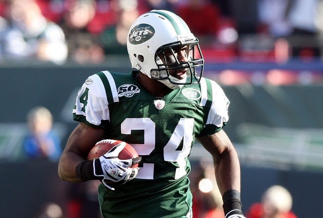 EAST RUTHERFORD, NJ - NOVEMBER 29:  Darrelle Revis #24 of the New York Jets runs the ball in for a first quarter touchdown after an interception against the Carolina Panthers on November 29, 2009 at Giants Stadium in East Rutherford, New Jersey.  (Photo by Jim McIsaac/Getty Images)