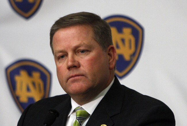 SOUTH BEND, IN - DECEMBER 11: Brian Kelly attends a press conference where he was named new football head coach at Notre Dame University on December 11, 2009 in South Bend, Indiana.  Kelly most recently led the University of Cincinnati to two consecutive Bowl Championship Series appearances including a perfect 12-0 record this past season. (Photo by Frank Polich/Getty Images)
