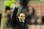 SUNDERLAND, ENGLAND - DECEMBER 15: Aston Villa manager Martin O'Neill salutes the fans after the final whistle of the Barclays Premier League match between Sunderland and Aston Villa at the Stadium of Light on December 15, 2009 in Sunderland, England.  (Photo by Michael Regan/Getty Images)