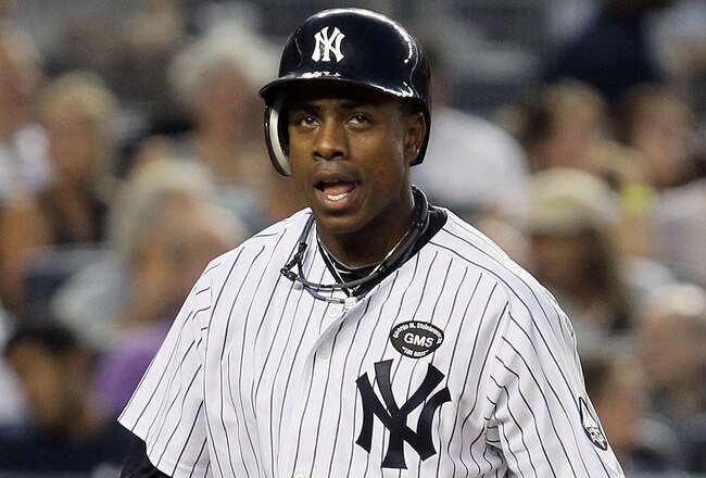 NEW YORK - JULY 16:  Curtis Granderson #14 of the New York Yankees looks on against the Tampa Bay Rays on July 16, 2010 at Yankee Stadium in the Bronx borough of New York City.  (Photo by Jim McIsaac/Getty Images)