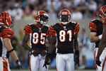 CANTON, OH - AUGUST 8: Terrell Owens #81 and Chad Ochocinco #85 of the Cincinnati Bengals look on against the Dallas Cowboys during the 2010 Pro Football Hall of Fame Game at the Pro Football Hall of Fame Field at Fawcett Stadium on August 8, 2010 in Canton, Ohio. (Photo by Joe Robbins/Getty Images)