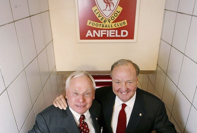 LIVERPOOL, UNITED KINGDOM - FEBRUARY 06:  American businessmen George Gillett (L) and Tom Hicks pose inside the players tunnel after their takeover of Liverpool Football Club on February 6, 2007, in Liverpool, England. Gillett and  Hicks have reached a deal, thought to be worth GBP470m, to buy the football club. (Photo by Peter Byrne - Pool/Getty Images)