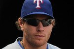 OAKLAND, CA - AUGUST 08:  Josh Hamilton #32 of the Texas Rangers looks on against the Oakland Athletics during an MLB game at the Oakland-Alameda County Coliseum on August 8, 2010 in Oakland, California.  (Photo by Jed Jacobsohn/Getty Images)