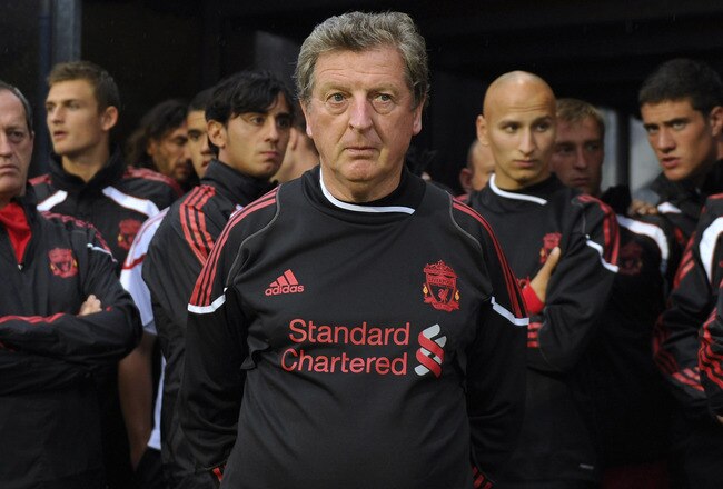 ALTACH, AUSTRIA - JULY 17: Roy Hodgson (C) manager of Liverpool FC waits for the start of the pre-season friendly match between Al-Hilal and Liverpool FC at the Cashpoint-Arena on July 17, 2010 in Altach, Austria.. The match was delayed due to heavy rain. (Photo by Thomas Kienzle/Getty Images)