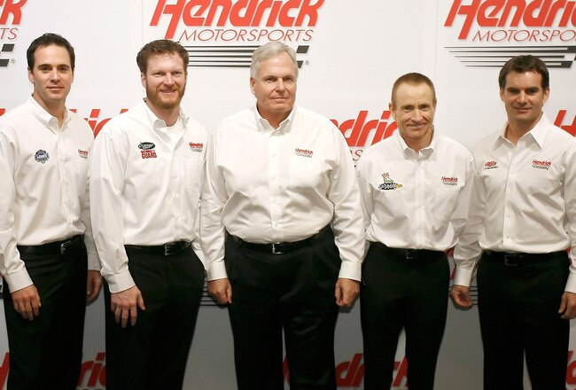 CONCORD, NC - JANUARY 20:  NASCAR team owner Rick Hendrick (C) poses with  Jimmie Johnson (1L), driver of the #48 Lowe's Chevrolet, Dale Earnhardt Jr. (2L), driver of the #88 AMP Energy/National Guard Chevrolet, Mark Martin (2R), driver of the #5 GoDaddy.com Chevrolet, and Jeff Gordon (1R), driver of the #24 DuPont Chevrolet, during the NASCAR Sprint Media Tour hosted by Charlotte Motor Speedway, held at Hendrick Motorsports, on January 20, 2010 in Concord, North Carolina.  (Photo by Jason Smith/Getty Images)