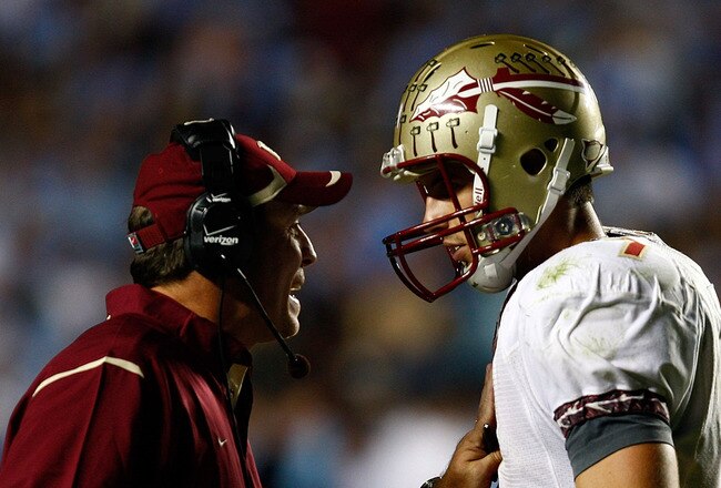 CHAPEL HILL, NC - OCTOBER 22:  Florida State Seminoles Offensive Coordinator Jimbo Fisher speaks with his quarterback Christian Ponder #7 during their game against the North Carolina Tar Heels at Kenan Stadium on October 22, 2009 in Chapel Hill, North Carolina.  (Photo by Scott Halleran/Getty Images)