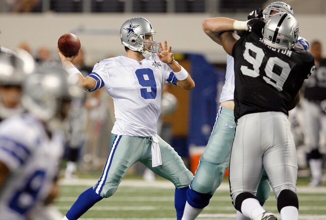 ARLINGTON, TX - AUGUST 12:  Tony Romo #9 looks to pass the ball during the preseason game against the Oakland Raiders at Dallas Cowboys Stadium on August 12, 2010 in Arlington, Texas.  (Photo by Tom Pennington/Getty Images)