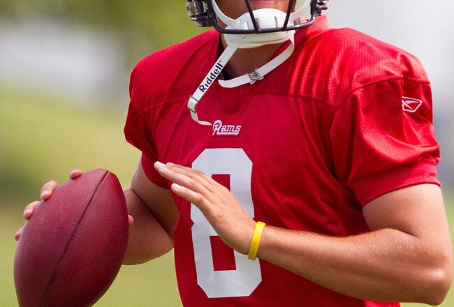 EARTH CITY, MO - JULY 31: Sam Bradford #8 of the St. Louis Rams passes during training camp at the Russell Athletic Training Facility on July 31, 2010 in Earth City, Missouri.  (Photo by Dilip Vishwanat/Getty Images)