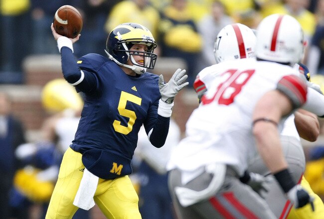 ANN ARBOR, MI - NOVEMBER 21: Tate Forcier #5 of the Michigan Wolverines throws a first quarter pass while playing the Ohio State Buckeyes on November 21, 2009 at Michigan Stadium in Ann Arbor, Michigan.  (Photo by Gregory Shamus/Getty Images)