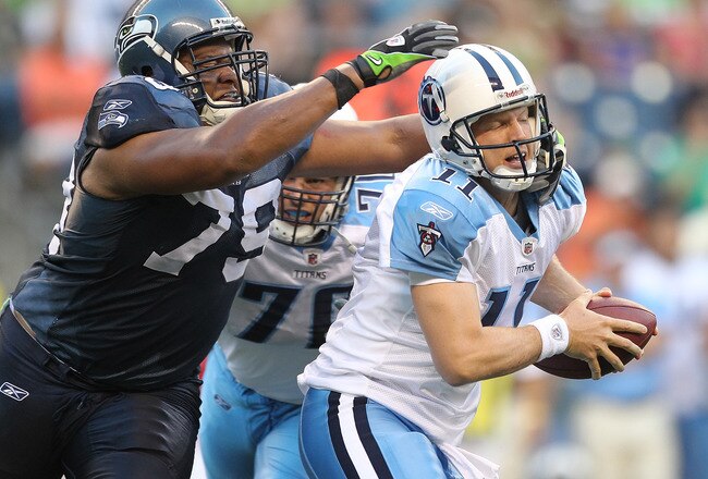 SEATTLE - AUGUST 14: Quarterback Chris Simms #11 of the Tennessee Titans is sacked during the preseason game by Red Bryant #79 of the Seattle Seahawks at Qwest Field on August 14, 2010 in Seattle, Washington. (Photo by Otto Greule Jr/Getty Images)