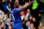 LONDON, ENGLAND - AUGUST 14:  Didier Drogba #11 celebrates after scoring his team's second goal during the Barclays Premier League match between Chelsea and West Bromwich Albion at Stamford Bridge on August 14, 2010 in London, England.  (Photo by Phil Cole/Getty Images)