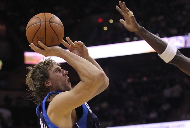 SAN ANTONIO - APRIL 29:  Dirk Nowitzki #41 of the Dallas Mavericks in Game Six of the Western Conference Quarterfinals during the 2010 NBA Playoffs at AT&T Center on April 29, 2010 in San Antonio, Texas. NOTE TO USER: User expressly acknowledges and agrees that, by downloading and or using this photograph, User is consenting to the terms and conditions of the Getty Images License Agreement.  (Photo by Ronald Martinez/Getty Images)