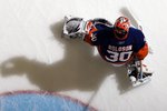 UNIONDALE, NY - APRIL 03:  Dwayne Roloson #30 of the New York Islanders warms up before playing against the Ottawa Senators on April 3, 2010 at Nassau Coliseum in Uniondale, New York.  (Photo by Jim McIsaac/Getty Images)