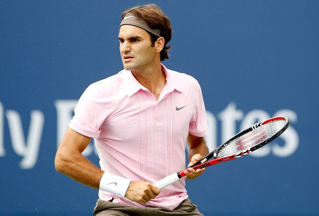 TORONTO, ON - AUGUST 15:  Roger Federer of Switzerland returns a shot to Andy Murray of Great Britain during the final of the Rogers Cup at the Rexall Centre on August 15, 2010 in Toronto, Canada.  (Photo by Matthew Stockman/Getty Images)