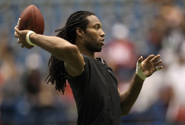 FLAGSTAFF, AZ - AUGUST 02:  Wide receiver Larry Fitzgerald #11 of the Arizona Cardinals practices in the team training camp at Northern Arizona University Walkup Skydome on August 2, 2010 in Flagstaff, Arizona.  (Photo by Christian Petersen/Getty Images)