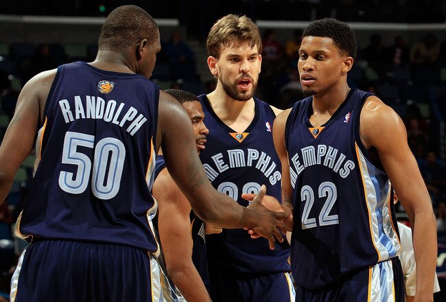 NEW ORLEANS - MARCH 03:  Zach Randolph #50, Mike Conley #11, Marc Gasol #33 congratulate Rudy Gay #22 of the Memphis Grizzlies after picking up a loose ball against the New Orleans Hornets at the New Orleans Arena on March 3, 2010 in New Orleans, Louisiana.  NOTE TO USER: User expressly acknowledges and agrees that, by downloading and/or using this Photograph, User is consenting to the terms and conditions of the Getty Images License Agreement.  (Photo by Chris Graythen/Getty Images)