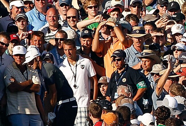 KOHLER, WI - AUGUST 15:  Dustin Johnson prepares to play his second shot on the 18th hole during the final round of the 92nd PGA Championship on the Straits Course at Whistling Straits on August 15, 2010 in Kohler, Wisconsin.  (Photo by Chris Graythen/Getty Images)